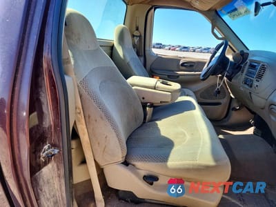 Zdjęcie 10 z 12 samochodu: 2000 FORD F150 VIN:1FTZF1721YNA94617 - miniatura