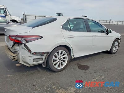 Trzecie zdjęcie samochodu z tyłu: 2022 TOYOTA CAMRY LE VIN:4T1C11AK9NU019965 - miniatura