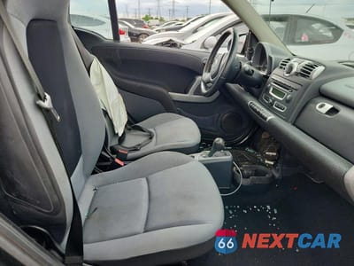 Zdjęcie 10 z 12 samochodu: 2009 SMART FORTWO PURE VIN:WMEEJ31X19K290798 - miniatura