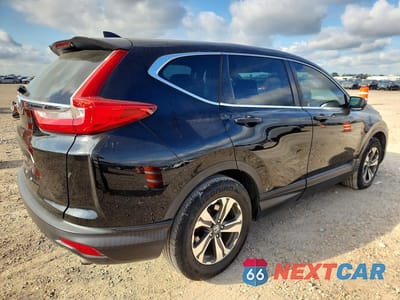 Trzecie zdjęcie samochodu z tyłu: 2018 HONDA CR-V LX VIN:2HKRW5H31JH412630 - miniatura