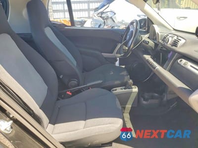 Zdjęcie 10 z 12 samochodu: 2013 SMART FORTWO PURE VIN:WMEEJ3BA2DK674155 - miniatura