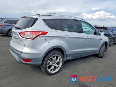 Czwarte zdjęcie samochodu z boku: 2014 FORD ESCAPE TITANIUM VIN:1FMCU0J91EUA77938 - miniatura