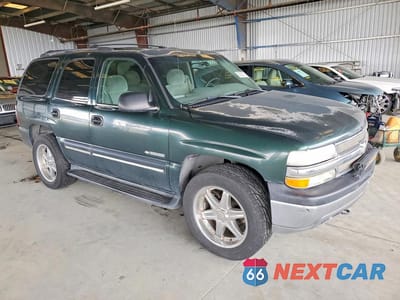 Czwarte zdjęcie samochodu z boku: 2001 CHEVROLET TAHOE K1500 VIN:1GNEK13T41J205223 - miniatura