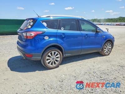 Trzecie zdjęcie samochodu z tyłu: 2017 FORD ESCAPE TITANIUM VIN:1FMCU0JD0HUC13274 - miniatura