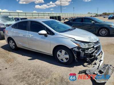 Czwarte zdjęcie samochodu z boku: 2017 CHEVROLET CRUZE LS VIN:1G1BC5SMXH7128884 - miniatura