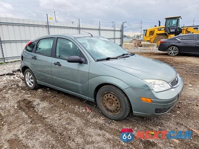 Czwarte zdjęcie samochodu z boku: 2005 FORD FOCUS VIN:3FAFP37N85R118173 - miniatura