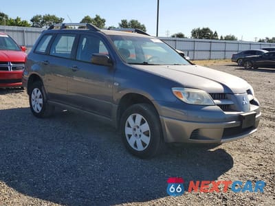 Czwarte zdjęcie samochodu z boku: 2005 MITSUBISHI OUTLANDER LS VIN:JA4LZ31F75U043946 - miniatura