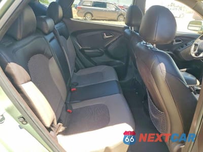 Zdjęcie 11 z 13 samochodu: 2011 HYUNDAI TUCSON GLS VIN:KM8JUCAC7BU264472 - miniatura