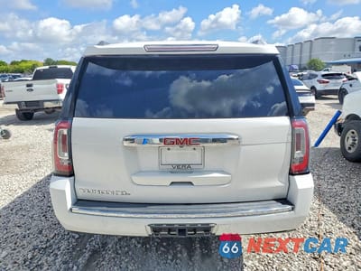 Zdjęcie 6 z 14 samochodu: 2016 GMC YUKON XL DENALI VIN:1GKS1HKJ0GR355013 - miniatura