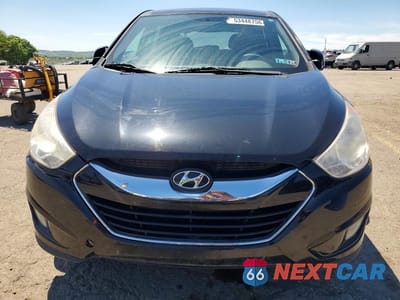 Piąte zdjęcie samochodu w środku: 2011 HYUNDAI TUCSON LIMITED VIN:KM8JUCACXBU282898 - miniatura