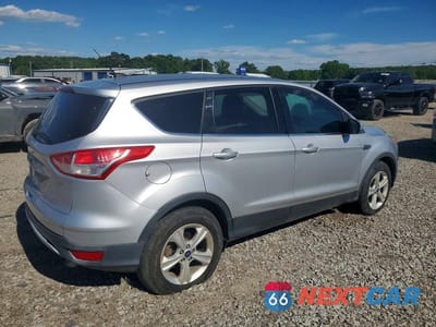 Trzecie zdjęcie samochodu z tyłu: 2016 FORD ESCAPE SE VIN:1FMCU0G76GUB71340 - miniatura