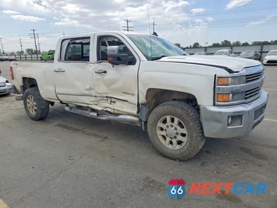 Czwarte zdjęcie samochodu z boku: 2015 CHEVROLET SILVERADO K2500 HEAVY DUTY LTZ VIN:1GC1KWE81FF565654 - miniatura
