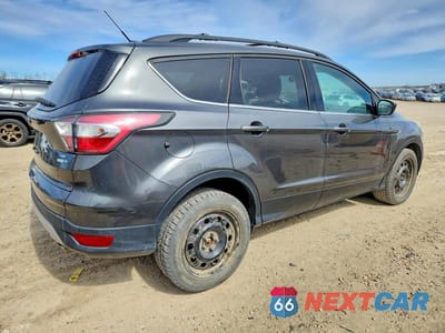 Trzecie zdjęcie samochodu z tyłu: 2017 FORD ESCAPE SE VIN:1FMCU9G93HUA41765 - miniatura