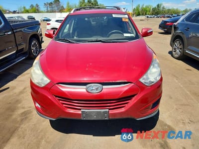 Piąte zdjęcie samochodu w środku: 2012 HYUNDAI TUCSON GLS VIN:KM8JUCAC4CU534775 - miniatura