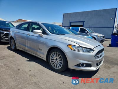Czwarte zdjęcie samochodu z boku: 2016 FORD FUSION SE PHEV VIN:3FA6P0PU6GR211704 - miniatura