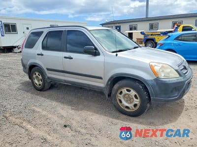 Czwarte zdjęcie samochodu z boku: 2005 HONDA CR-V LX VIN:JHLRD68585C007219 - miniatura