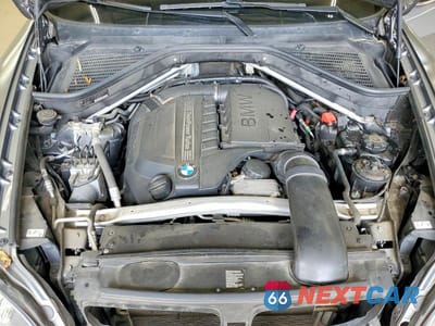 Zdjęcie 12 z 13 samochodu: 2013 BMW X5 XDRIVE35I VIN:5UXZV4C57D0E04086 - miniatura