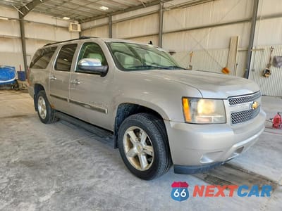 Czwarte zdjęcie samochodu z boku: 2008 CHEVROLET SUBURBAN K1500 LS VIN:1GNFK16308J209909 - miniatura