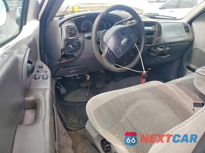Zdjęcie 8 z 12 samochodu: 1999 FORD F150 VIN:1FTRX18L3XNA64179 - miniatura