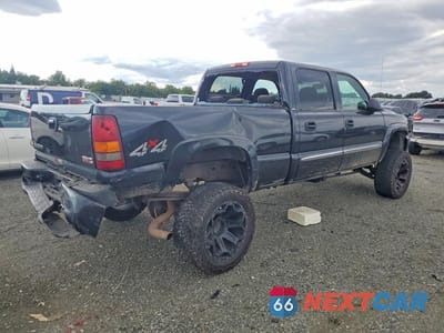 Trzecie zdjęcie samochodu z tyłu: 2003 GMC SIERRA K1500 HEAVY DUTY VIN:1GTGK13U63F210147 - miniatura