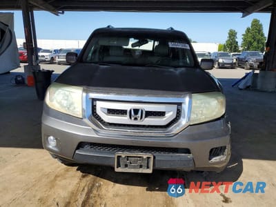 Piąte zdjęcie samochodu w środku: 2011 HONDA PILOT TOURING VIN:5FNYF4H98BB009089 - miniatura