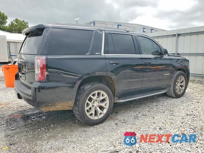 Trzecie zdjęcie samochodu z tyłu: 2016 GMC YUKON SLT VIN:1GKS2BKC5GR417002 - miniatura