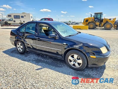 Czwarte zdjęcie samochodu z boku: 2005 VOLKSWAGEN JETTA GLS TDI VIN:3VWSR69M75M038799 - miniatura