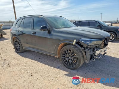 Czwarte zdjęcie samochodu z boku: 2022 BMW X5 M50I VIN:5UXJU4C08N9L26271 - miniatura