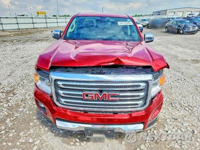 Piąte zdjęcie samochodu w środku: 2016 GMC CANYON SLT VIN:1GTG6DE3XG1218152 - miniatura