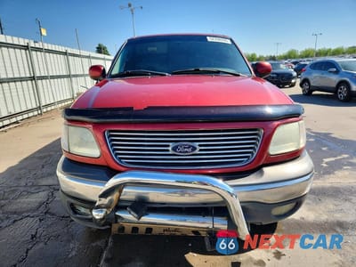 Piąte zdjęcie samochodu w środku: 2002 FORD F150 VIN:1FTRX18L52NB47637 - miniatura