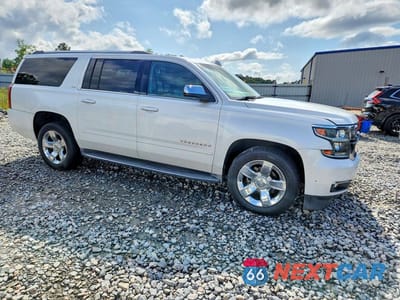 Czwarte zdjęcie samochodu z boku: 2016 CHEVROLET SUBURBAN C1500 LTZ VIN:1GNSCJKC9GR429776 - miniatura