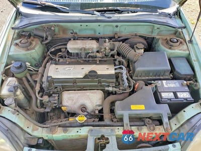 Zdjęcie 11 z 12 samochodu: 2003 HYUNDAI ACCENT GL VIN:KMHCG45C33U429984 - miniatura
