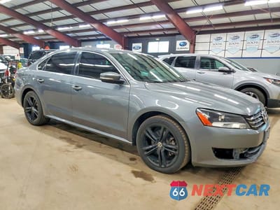 Czwarte zdjęcie samochodu z boku: 2014 VOLKSWAGEN PASSAT SE VIN:1VWBS7A3XEC035703 - miniatura