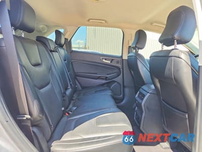 Zdjęcie 11 z 13 samochodu: 2022 FORD EDGE TITANIUM VIN:2FMPK4K96NBA31380 - miniatura