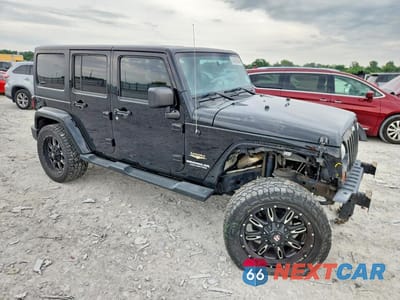 Czwarte zdjęcie samochodu z boku: 2012 JEEP WRANGLER UNLIMITED SAHARA VIN:1C4BJWEG8CL184802 - miniatura
