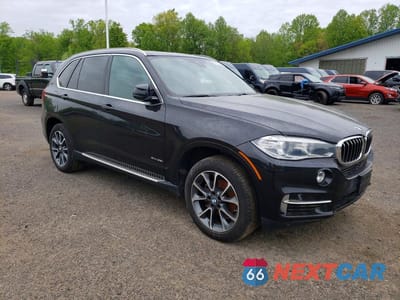 Czwarte zdjęcie samochodu z boku: 2018 BMW X5 XDRIVE35I VIN:5UXKR0C5XJL072005 - miniatura