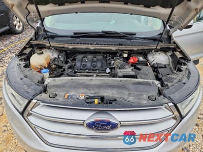 Zdjęcie 11 z 12 samochodu: 2015 FORD EDGE TITANIUM VIN:2FMPK3K88FBB38482 - miniatura