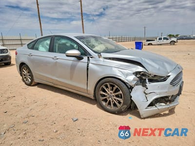 Czwarte zdjęcie samochodu z boku: 2017 FORD FUSION SE VIN:3FA6P0H73HR150645 - miniatura