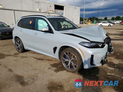 Czwarte zdjęcie samochodu z boku: 2025 BMW X5 XDRIVE40I VIN:5UX23EU09S9X79502 - miniatura