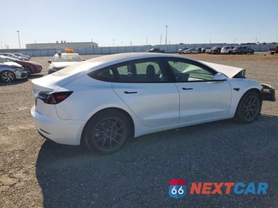 Trzecie zdjęcie samochodu z tyłu: 2022 TESLA MODEL 3 VIN:5YJ3E1EA6NF362039 - miniatura