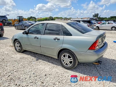 Drugie zdjęcie samochodu z przodu: 2003 FORD FOCUS SE VIN:1FAFP34P23W227986 - miniatura