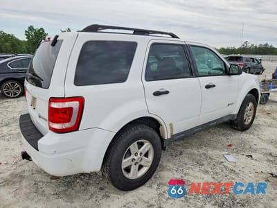 Trzecie zdjęcie samochodu z tyłu: 2010 FORD ESCAPE HYBRID VIN:1FMCU4K37AKD40831 - miniatura