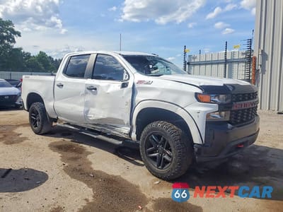 Czwarte zdjęcie samochodu z boku: 2021 CHEVROLET SILVERADO K1500 TRAIL BOSS CUSTOM VIN:3GCPYCEF4MG338802 - miniatura