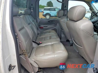 Zdjęcie 10 z 13 samochodu: 2001 FORD F150 SUPERCREW VIN:1FTRW07L31KC51736 - miniatura