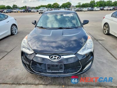 Piąte zdjęcie samochodu w środku: 2013 HYUNDAI VELOSTER BASE VIN:KMHTC6AD0DU107262 - miniatura