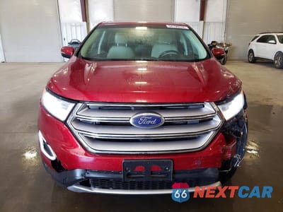 Piąte zdjęcie samochodu w środku: 2016 FORD EDGE TITANIUM VIN:2FMPK4K92GBB23718 - miniatura