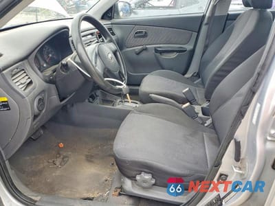 Zdjęcie 7 z 12 samochodu: 2010 KIA RIO BASE VIN:KNADH4A33A6680109 - miniatura
