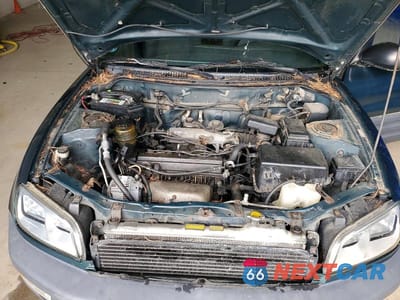 Zdjęcie 11 z 12 samochodu: 1998 TOYOTA RAV4 BASE VIN:JT3GP10V3W7028536 - miniatura