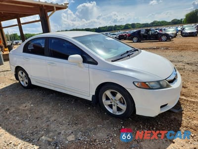 Czwarte zdjęcie samochodu z boku: 2011 HONDA CIVIC LX-S VIN:19XFA1F64BE041184 - miniatura