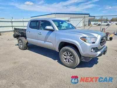 Czwarte zdjęcie samochodu z boku: 2019 TOYOTA TACOMA SR5 V6 VIN:3TMCZ5AN4KM224012 - miniatura